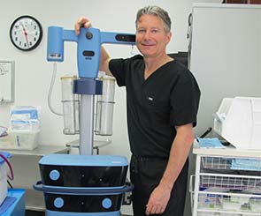 Dr. Caridi with surgical instrument